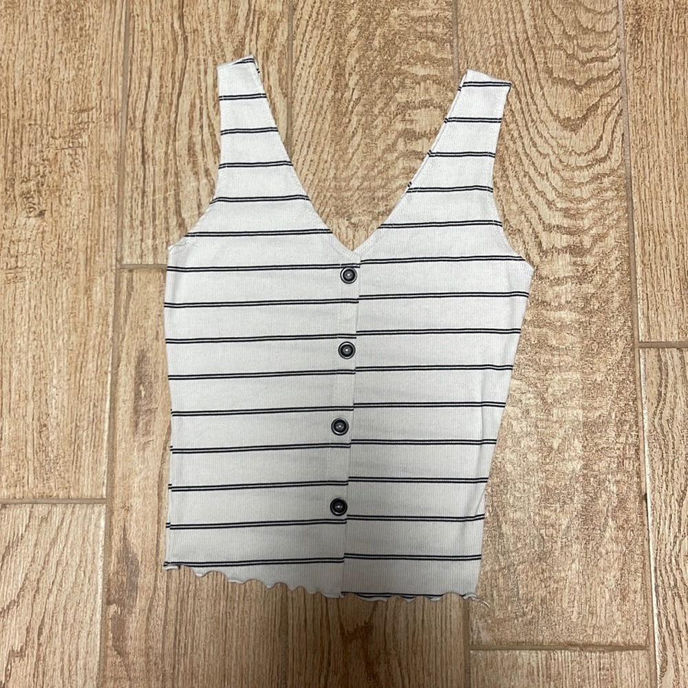 SOLD - Cute little tank top. Gently worn. No stains holes or tears. Size small